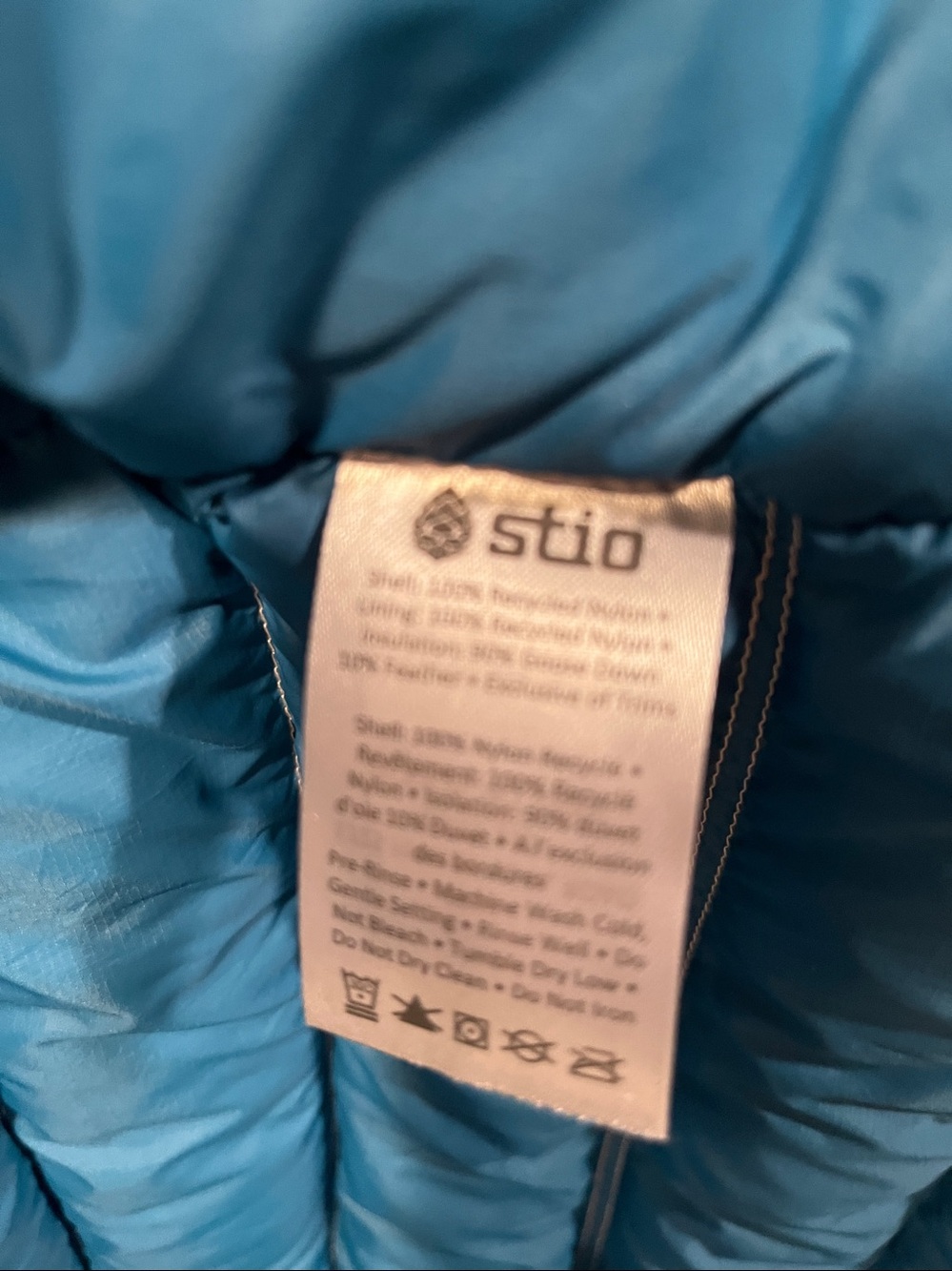 Stio Men's Hooded Packable Goose Down Vest Cream With Blue Lining - Picture 7 of 14
